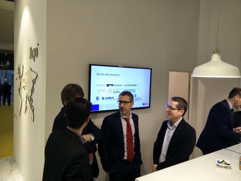 visitors listen to Royo's R&D Director, César Taboas